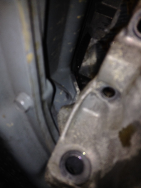 This is the driver side - you can see the little piece preventing me from pulling it down.