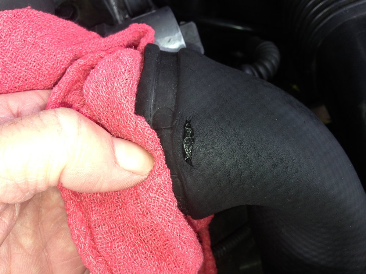 Torn intercooler throttle body hose can better see mesh lining