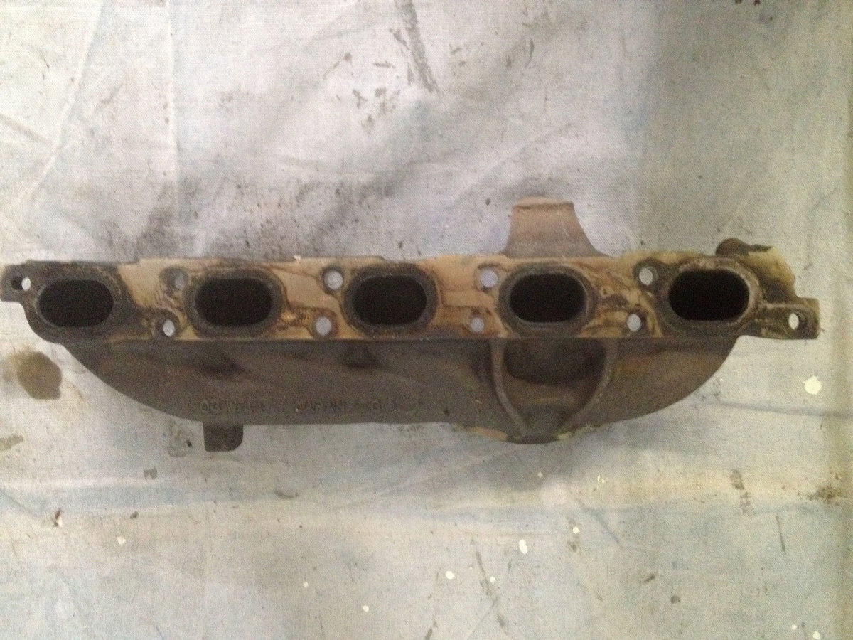 It is the newer "Japanifold". They are actually all made in Japan.