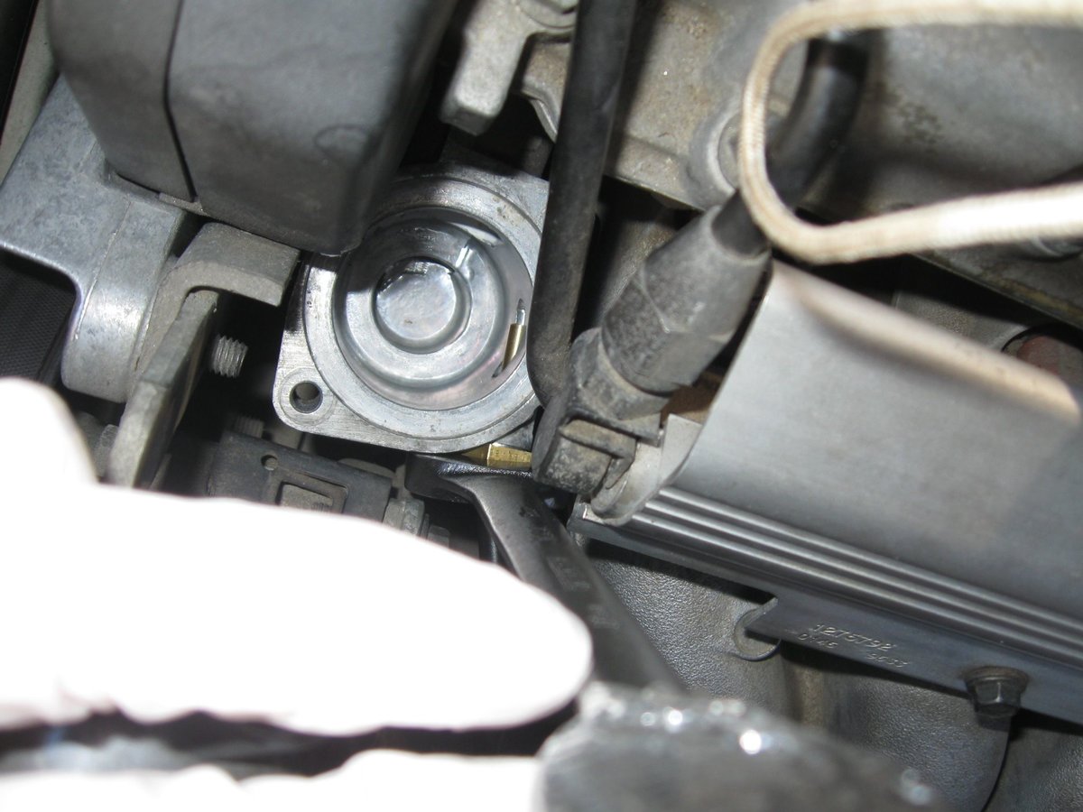 19mm open ended wrench from the top to tighten up the ECT.