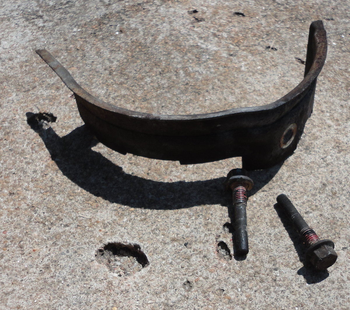 Timing guard and two 10mm bolts.