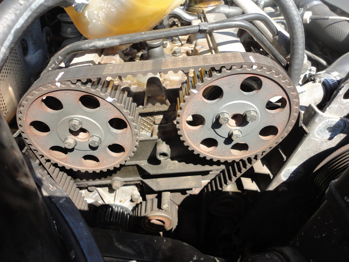 Marking old belt and intake/exhaust cam so I can compare to new belt.  If timing doesn't slip the amount of teeth between marks should be the same for new belt.