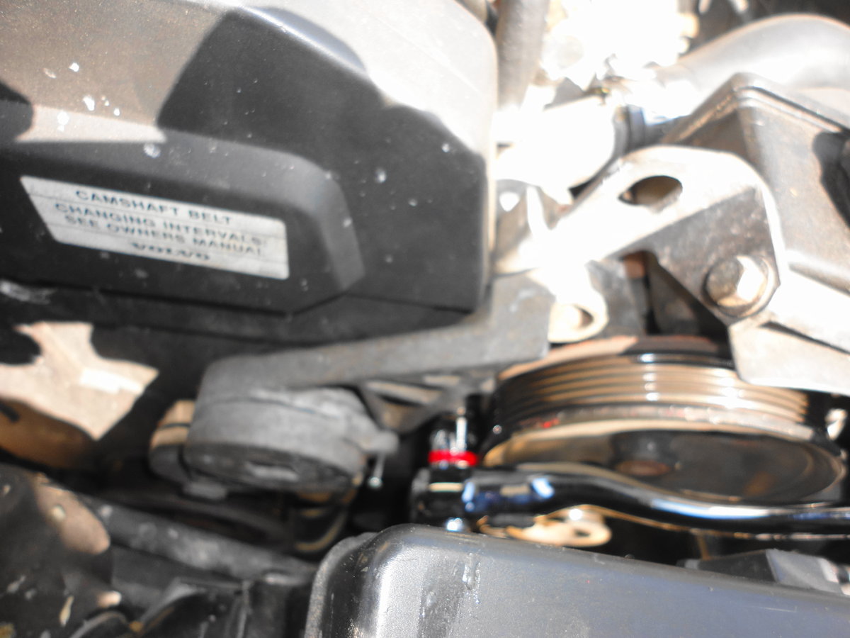 Removing serp belt tensioner (12mm).