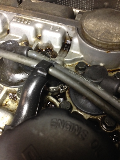 oil on top of valve cover - oetiker clamp?