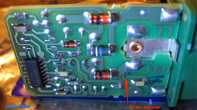 Three dots on the back of the board -- mystery indicator