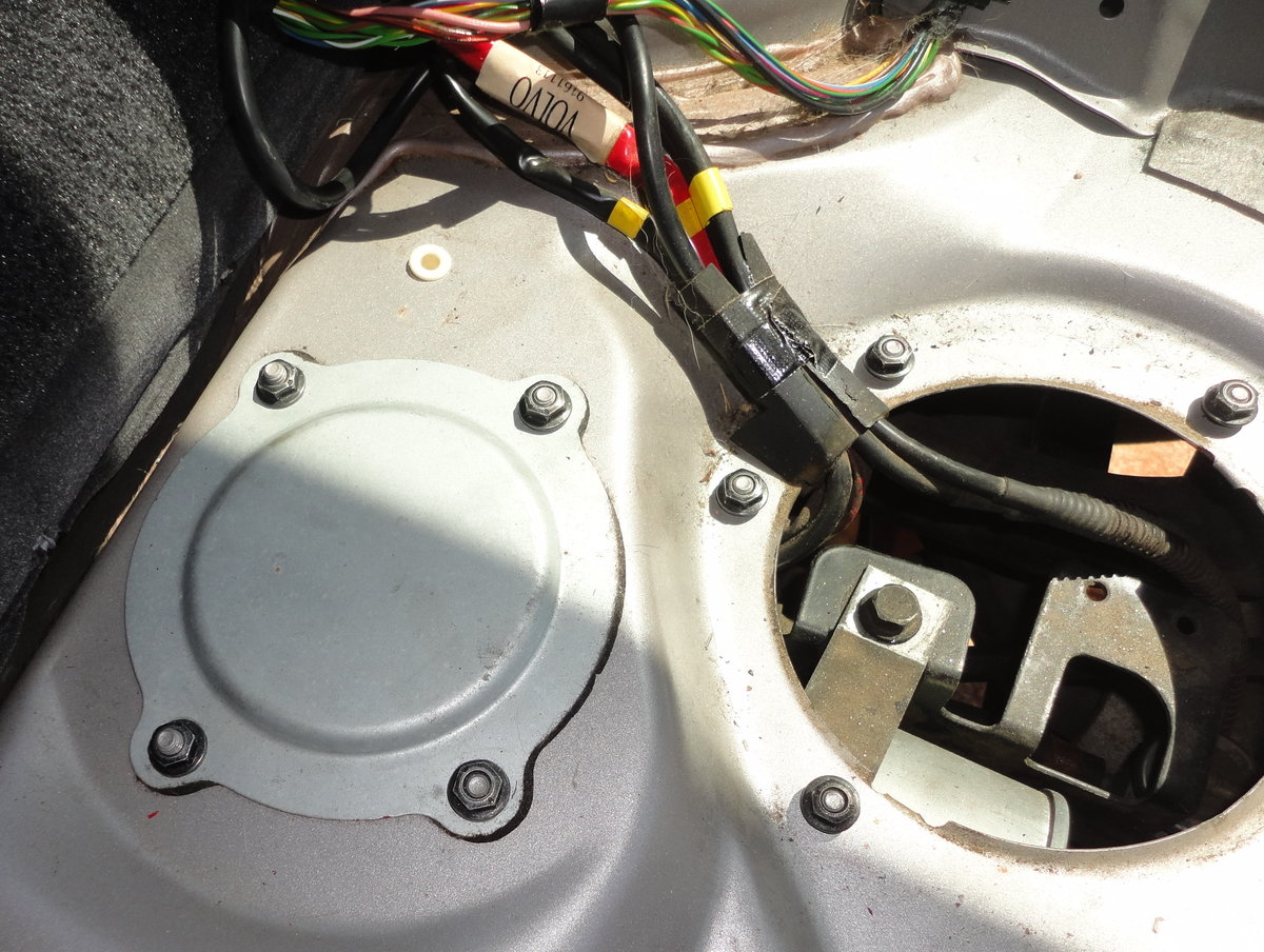 Wiring harness out of the way exposing 2nd access panel.