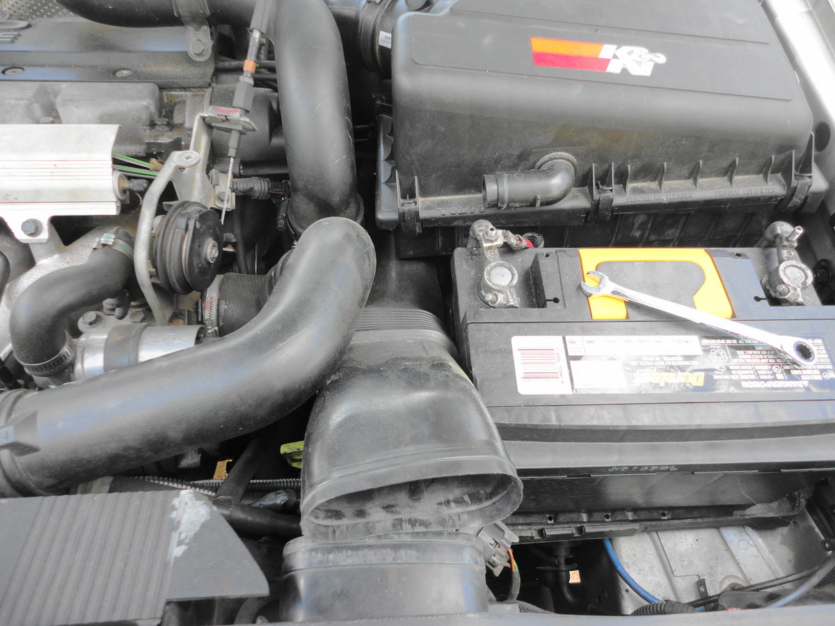 Purge valve is located underneath air duct.