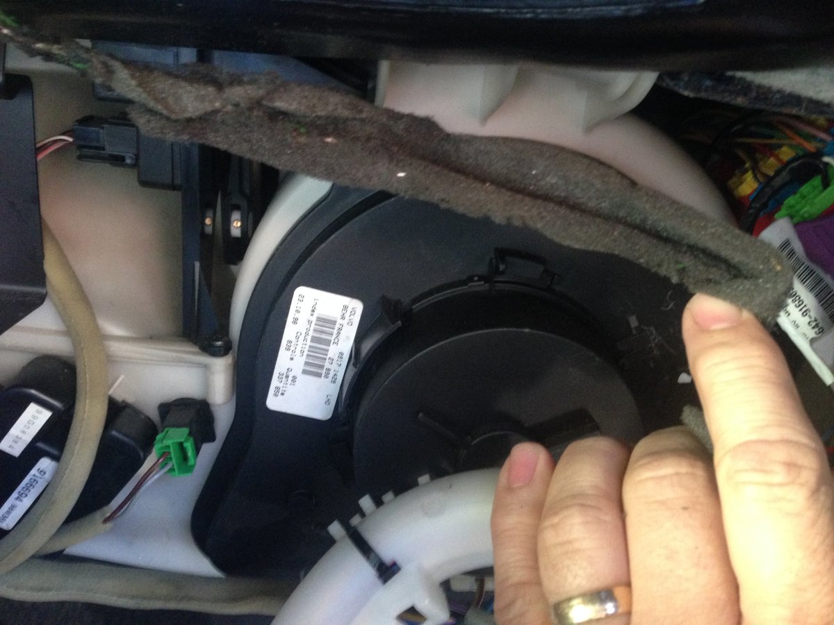 Blower motor is black plastic - held in with four screws
