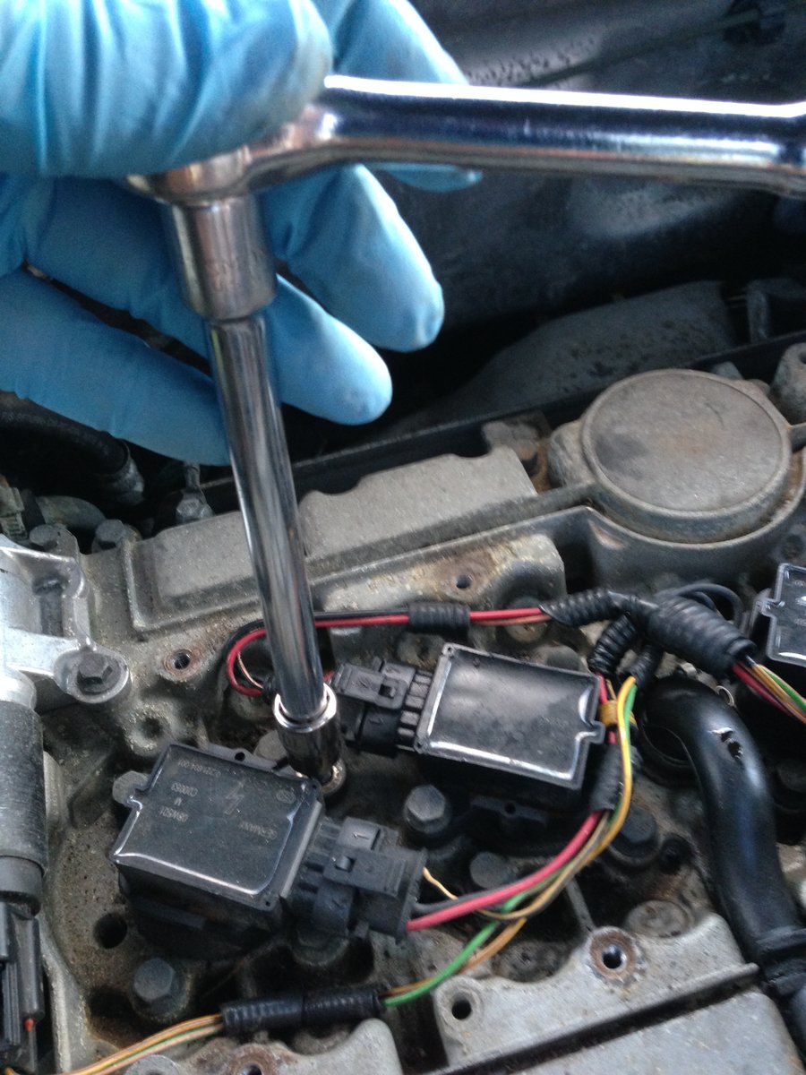 Remove 10mm bolt holding down coil - QTY 1 per coil