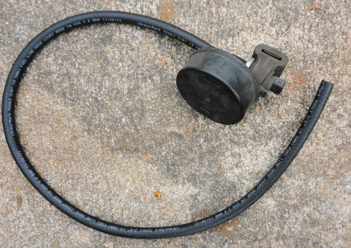 Shut-off valve with three feet of 3/8 hose to run over the wheel well to the "air" side of canister.