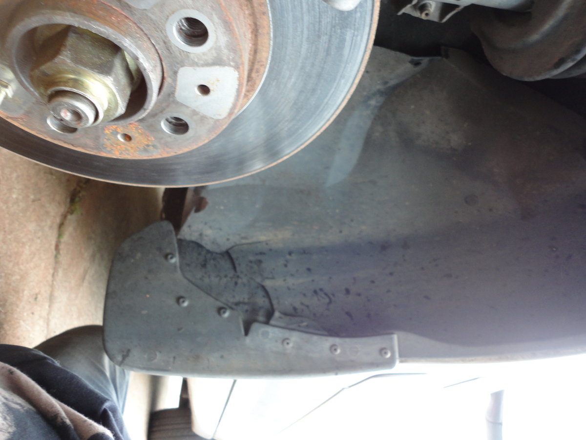 Removed wheel to gain access to rear of fender skirt.  Shut-off valve is behind this.