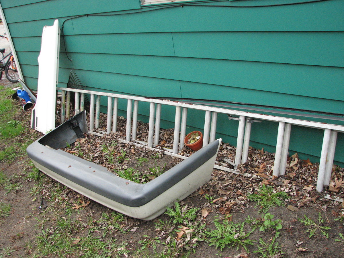 Updated bumper for the sedan. Fender as well though there is only a small dent in the Sedan.
