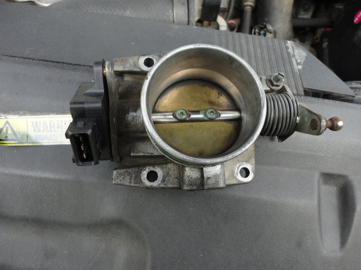 Throttle Body with TPS on side.