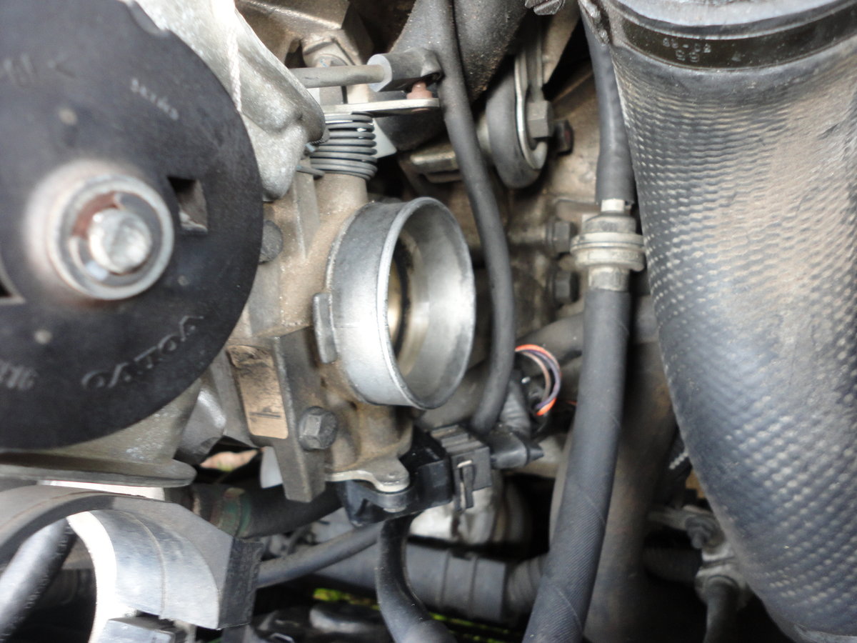 Four 10mm bolts and linkage hold TB.