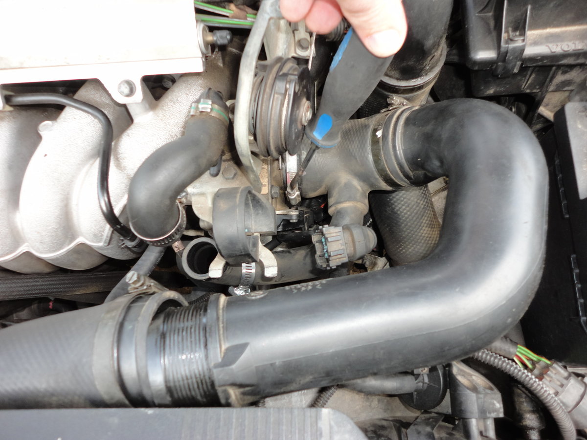 Removing inter-cooler hose.