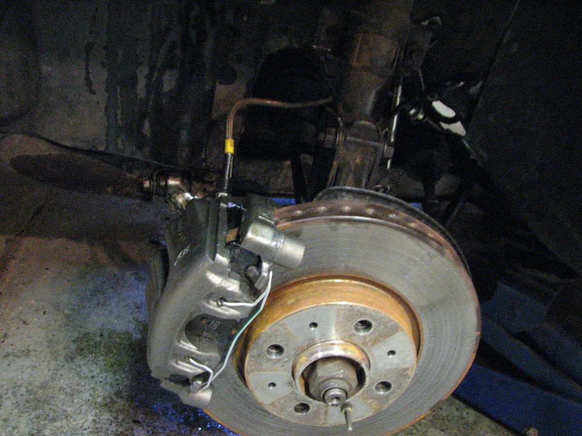 Four lug Brembo rotors installed before Sedan '93 new calipers and braided lines.