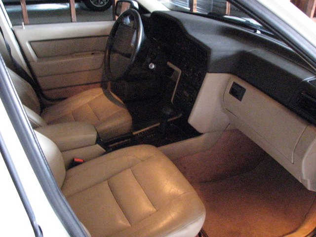 Original black salvaged dash in the '93 Sedan. Heat gun only.