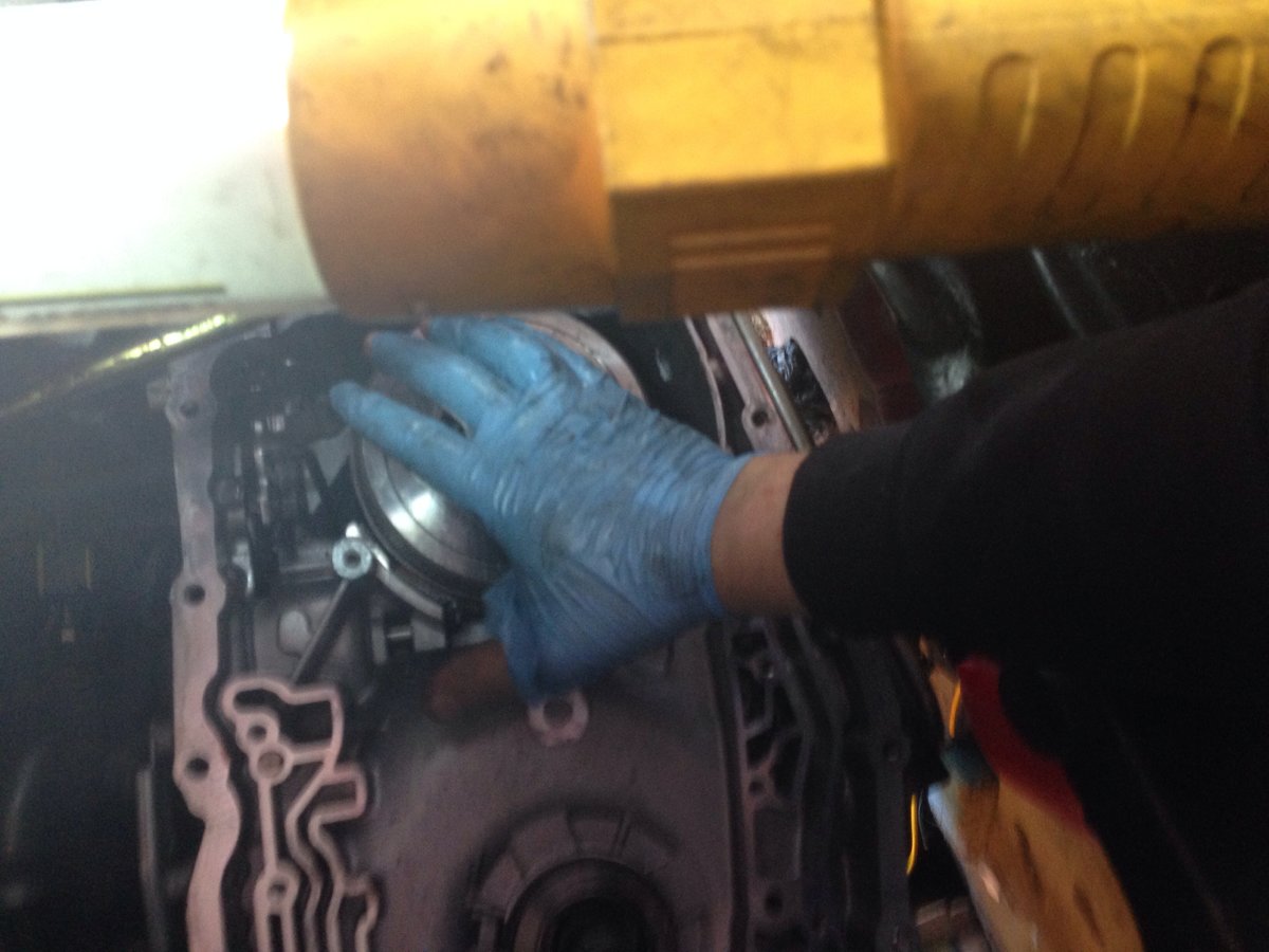 Valve body and channel plate off, clutch packs and various bits come out.  Clean everything, look for wear, missing chunks of steel.  All of my bands and hard parts were fine.