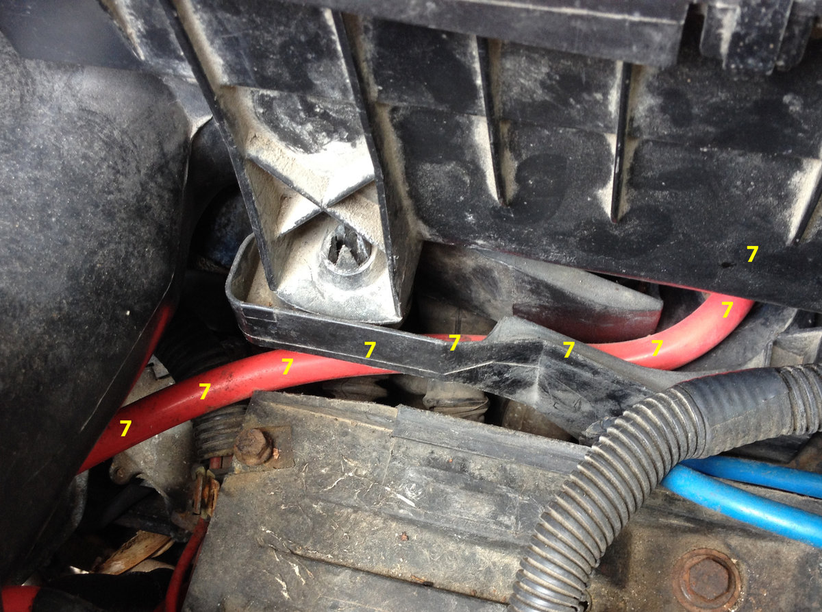 Line 7 disappears under the airbox on its way to the brake booster at the firewall.