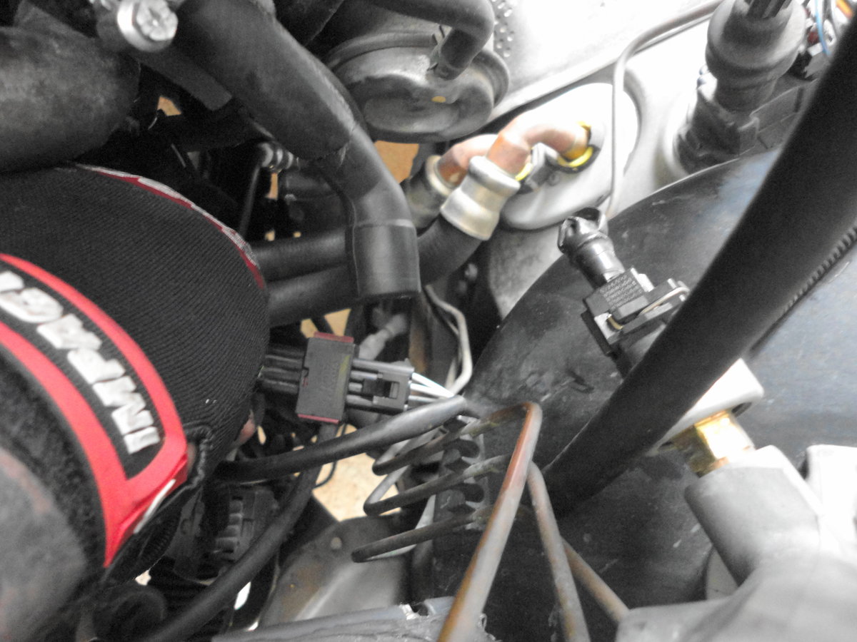 Connector with lock tab.