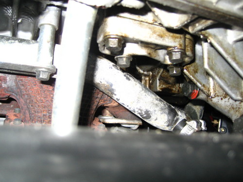 Oil appears to be coming from high up, behind engine support bracket, similar to cam seal leak.