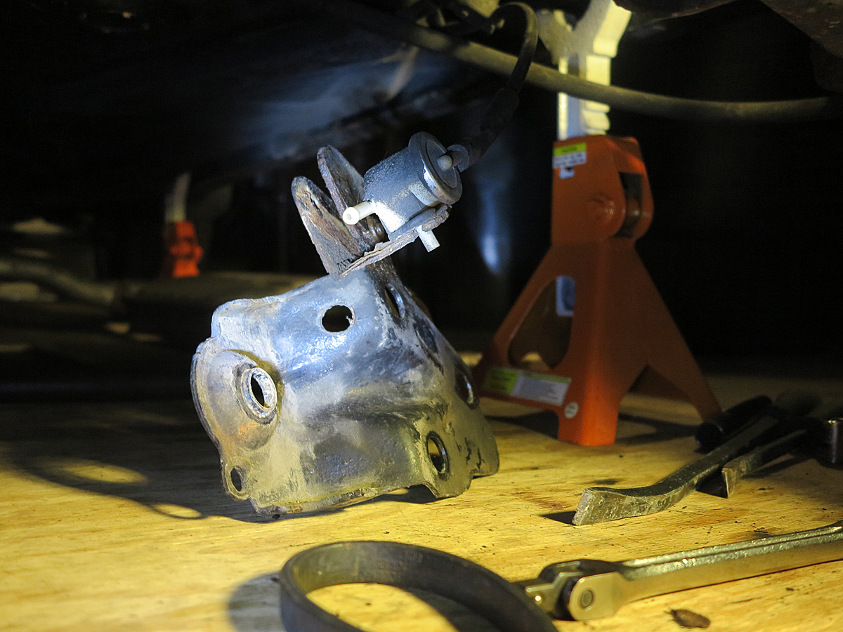 take off 10mm fuel filter bracket screw, pull off valve vacuum hose to the engine, and set the delta mount bracket on the ground at passenger side