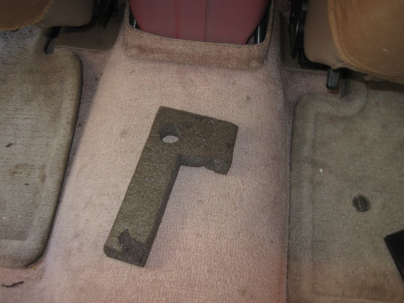 Random piece of Foam, one side sticky (the side that is facing camera right now).