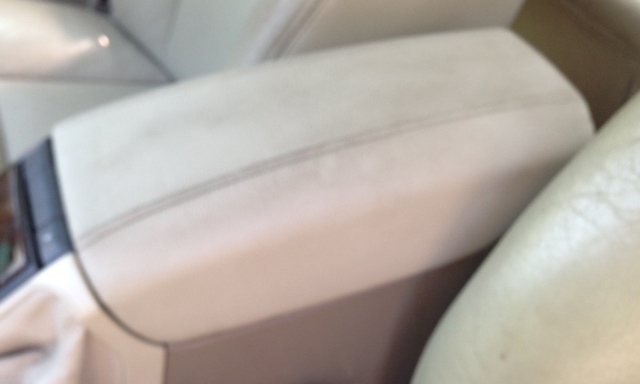 Armrest frame and cover now snugly latched down.