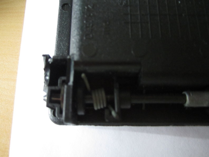 Spring fitment in lock assembly to pre-load connecting rod and latch