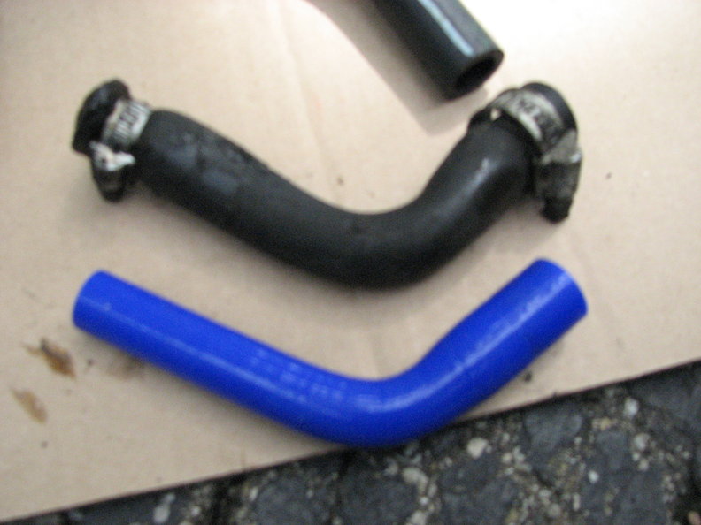 Severely bloated and soft Turbo coolant return hose.