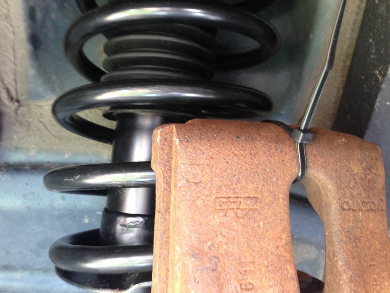 Another great use for zip ties - holding up the caliper