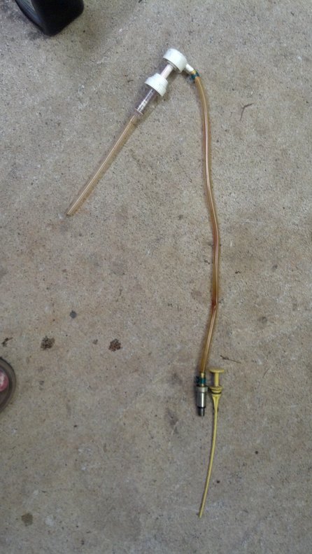 Lower unit oil fill pump