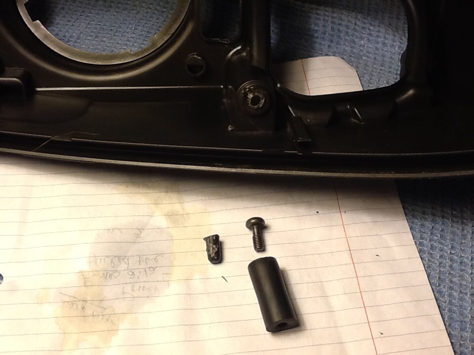Broken tab on black case drilled out for a 5/16 screw that is inserted into rubber tube