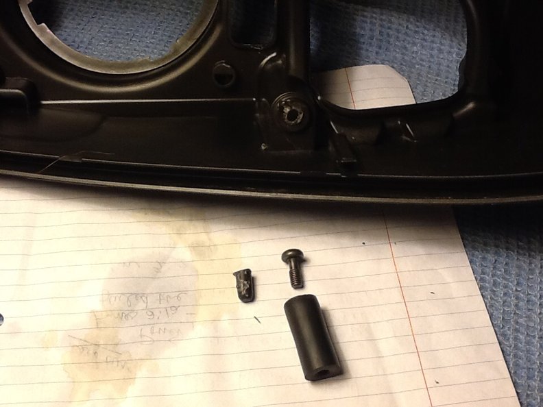 Broken tab on black case drilled out for a 5/16 screw that is inserted into rubber tube