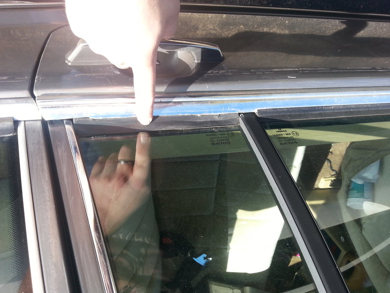 Rear side door window trim.