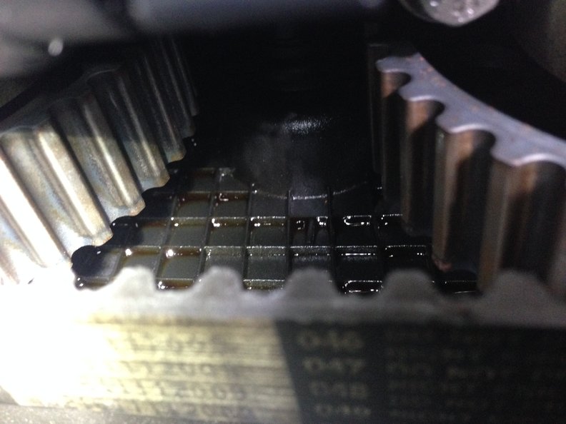 Evidence of oil behind pulleys