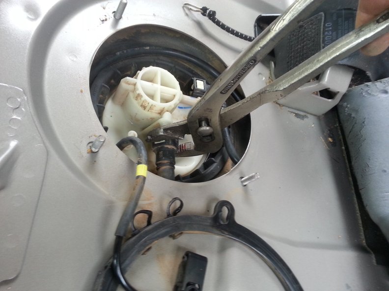 I found it easy to press both clips with one of these