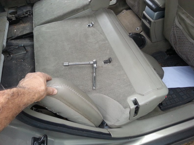 Pull on this bolster and it will eventually come out