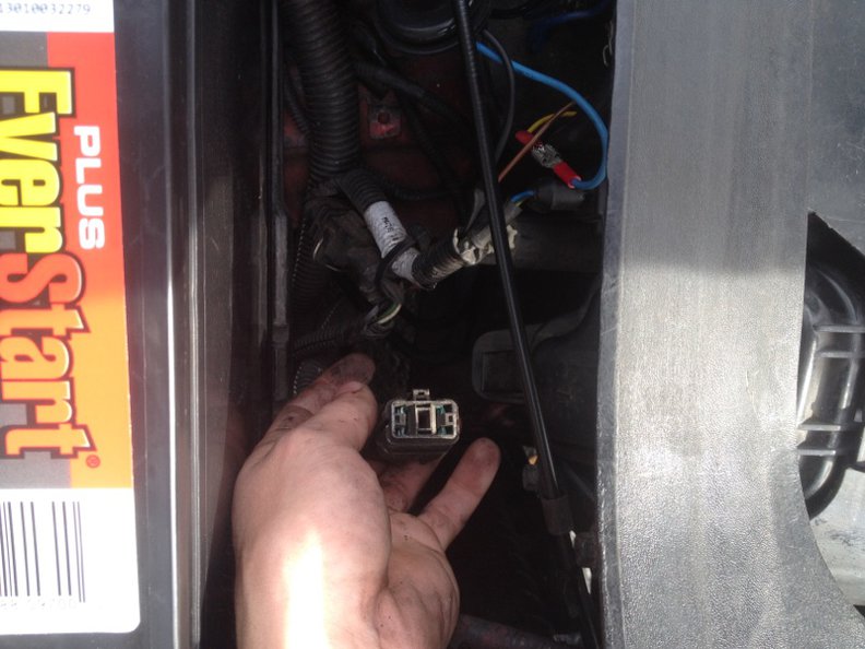 wire near battery and headlight