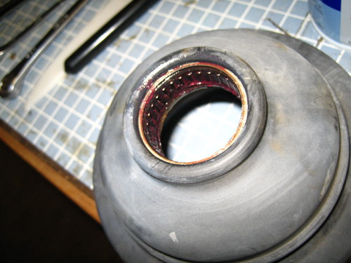 Pack the needle bearing in the steering column bearing with grease.