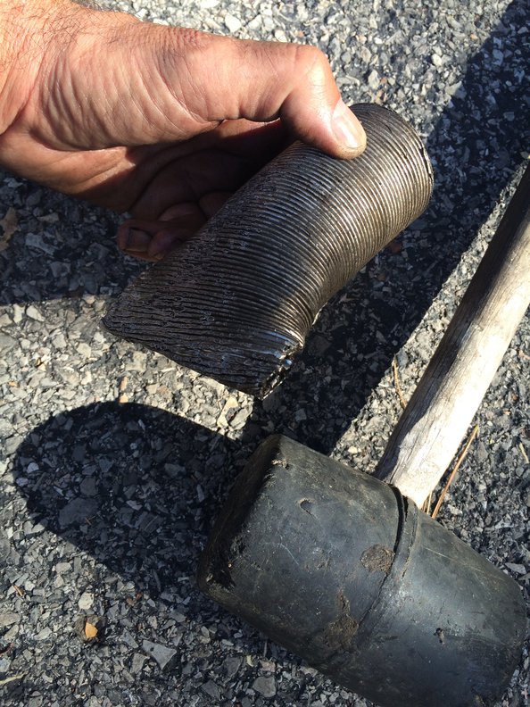 Use a rubber mallet to close the end of the pre-heat hose.