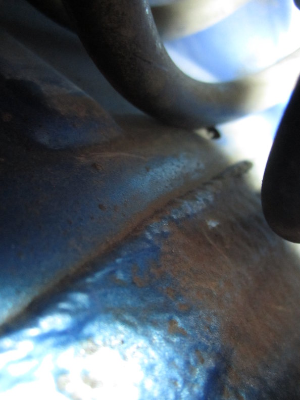 LH front spring rubbing on inner fender