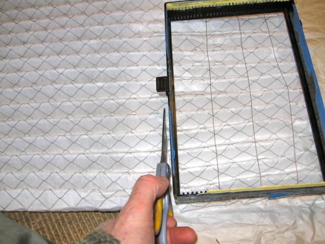 Strip off all the cardboard and cut the filter media