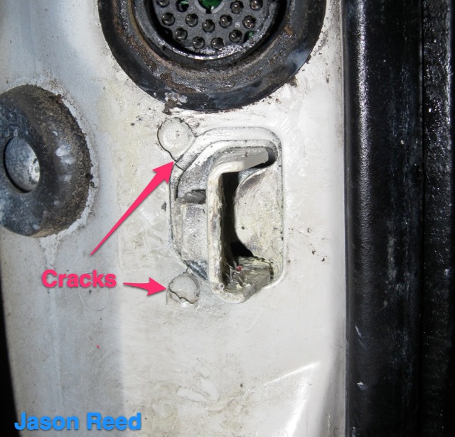 Cracks in hinge weld.jpg
