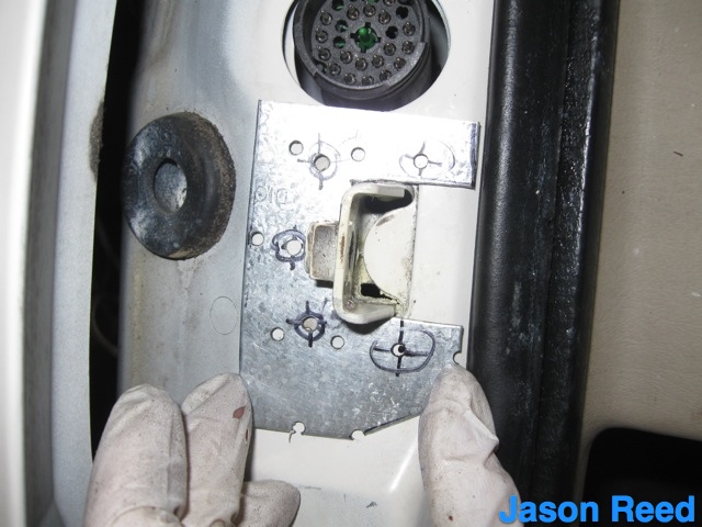 Hold up plate to mark A-pillar for drilling.jpg