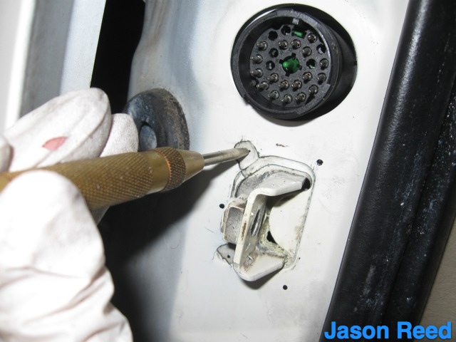 Strike the holes on the A-pillar before drilling .jpg