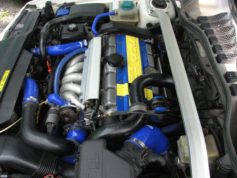 I was going to leave the timing belt cover open so you could see the Gates Blue Belt. Kidding.