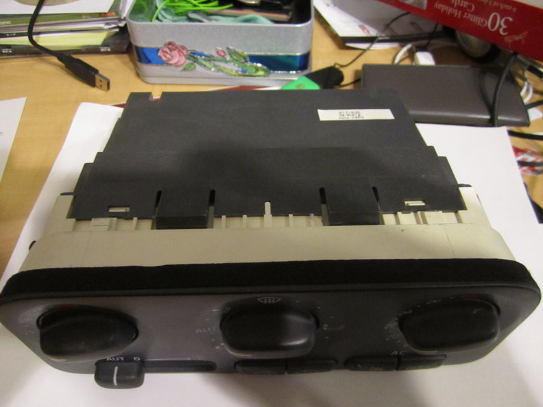 ECC unit and view of 2 top retaining tabs. 2 below also