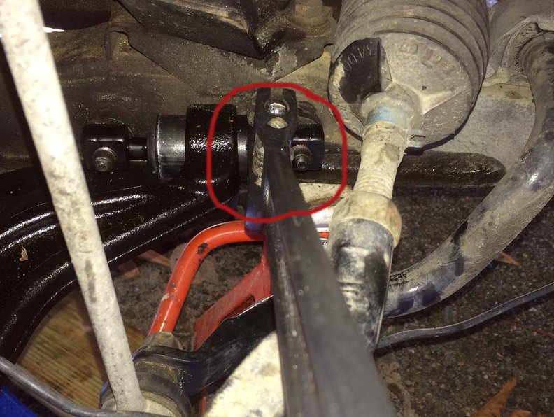 Rear of Control Arm with Crescent Wrench on flat spot for leverage.
