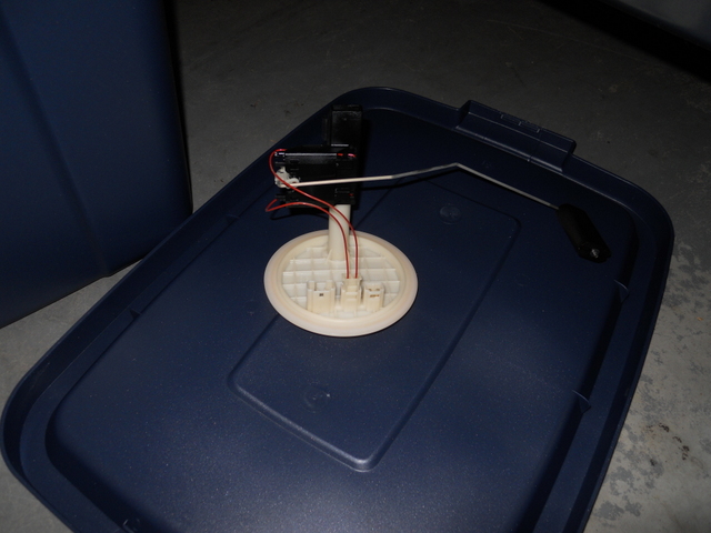 Driver side pump cover with level sensor